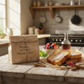 Package of frozen homemade French toast with golden-brown slices and fresh berries on a rustic wooden surface